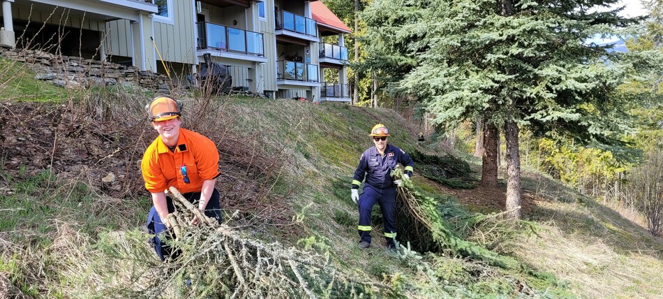 Sicamous Fire Department members assisting a FireSmart Community Clean-Up at Shuswap Villas this April.